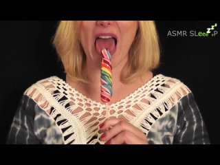 asmr mature blonde woman sucking a rainbow lollipop with passion
